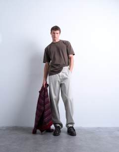 Model wearing Straight leg twill elasticated waist trouser in stone
