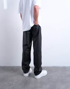Model wearing Straight real leather trouser in black