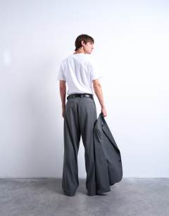 Model wearing Straight suit trouser in charcoal pinstripe