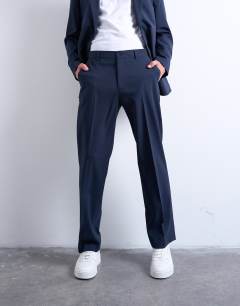Model wearing Straight wool touch suit trousers in navy