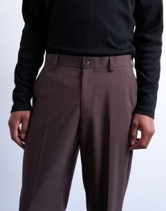 Model wearing Straight wool touch trousers in chocolate