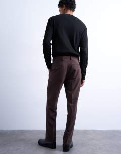 Model wearing Straight wool touch trousers in chocolate