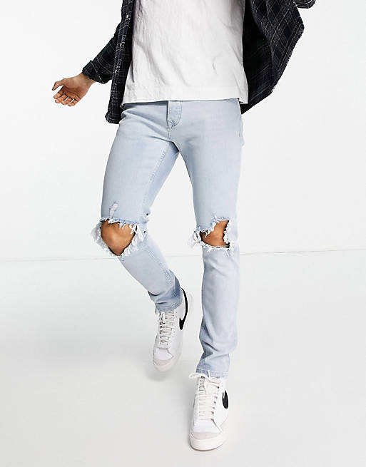 Topman stretch skinny extreme blow out rip jeans in light wash | ASOS