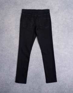 Model wearing Stretch skinny jean in black