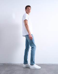 Model wearing Stretch skinny jean in light wash
