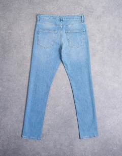Model wearing Stretch skinny jean in light wash
