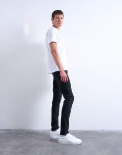 Model wearing Stretch skinny jean in washed black