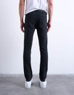 Model wearing Stretch skinny jean in washed black