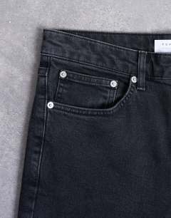 Model wearing Stretch skinny jean in washed black