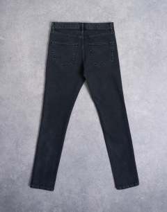 Model wearing Stretch skinny jean in washed black