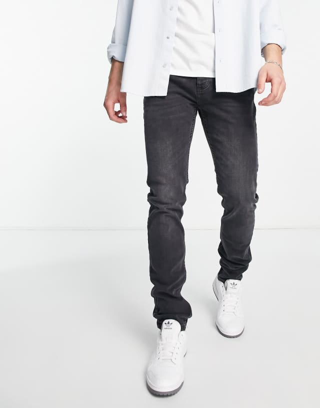 Topman stretch skinny jeans in washed black