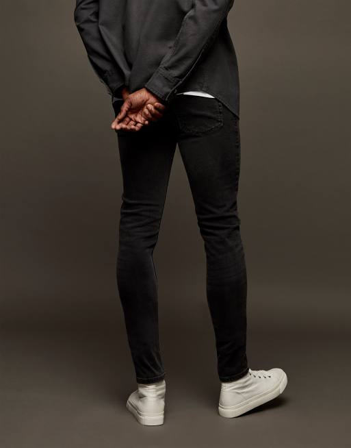 Topman stretch skinny jeans in washed black