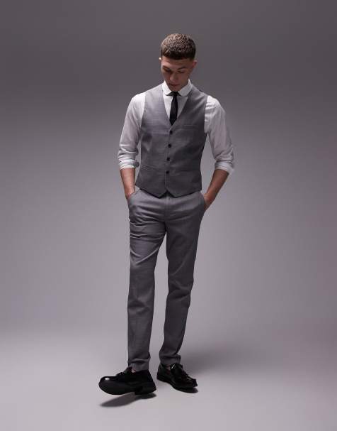 black suit and grey pants