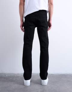 Model wearing Stretch slim jean in black