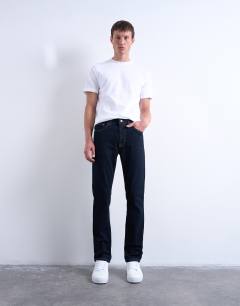 Model wearing Stretch slim jean in raw