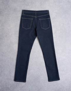 Model wearing Stretch slim jean in raw