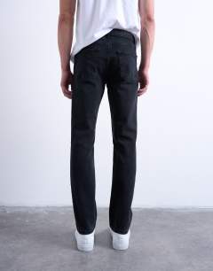 Model wearing Stretch slim jean in washed black