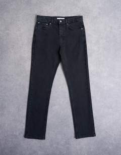 Model wearing Stretch slim jean in washed black