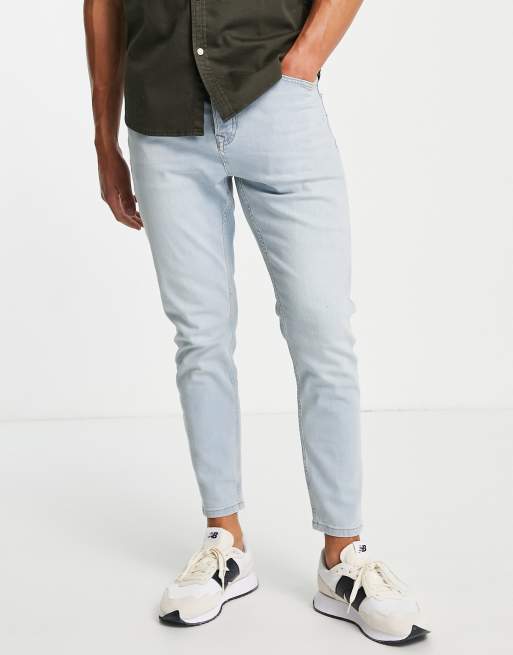 Topman stretch taper jeans in light wash tint