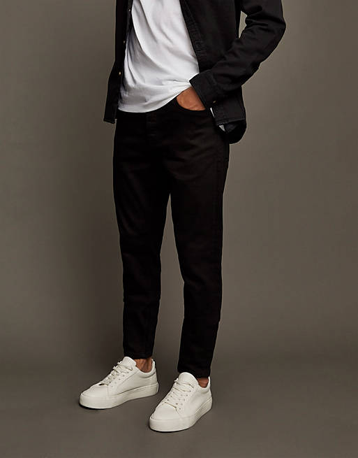 Topman stretch tapered jeans in black