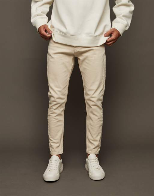 Topman stretch tapered jeans in ecru