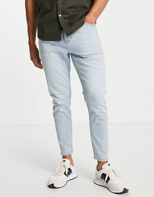 Topman stretch tapered jeans in light wash tint
