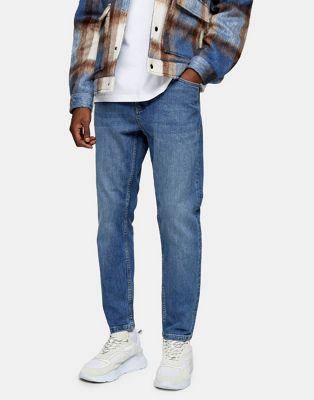Topman stretch tapered jeans in mid 