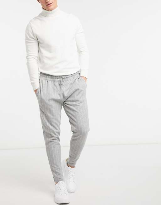 Grey sweatpants with store white stripe