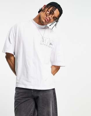 T-shirt super oversize bianca con stampa verticale a fiori-Bianco - Topman T-shirt donna  - immagine1
