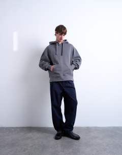 Model wearing Taper fit twill trouser in navy