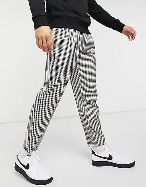 Men Topman tapered check trousers in black and white 