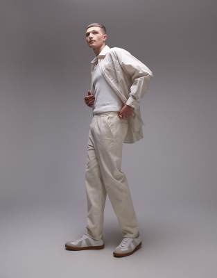 tapered cord pants in ecru-White