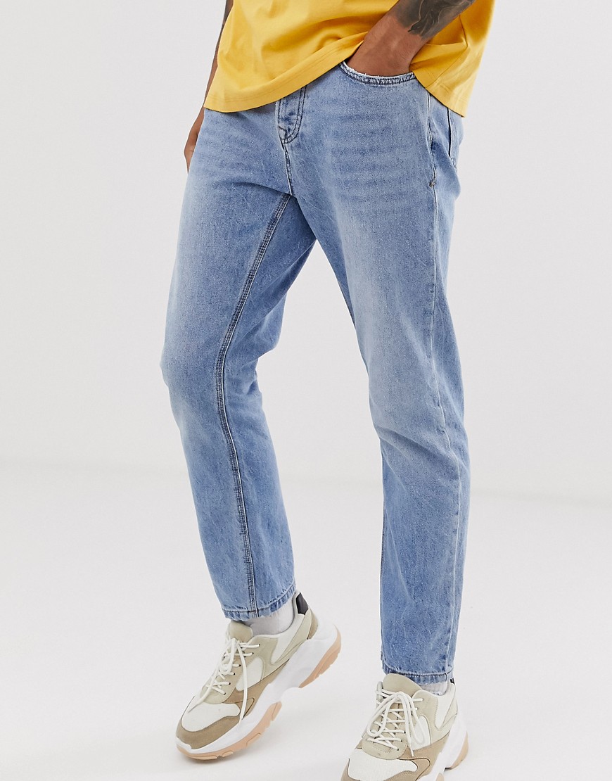 Tapered jeans in blue wash