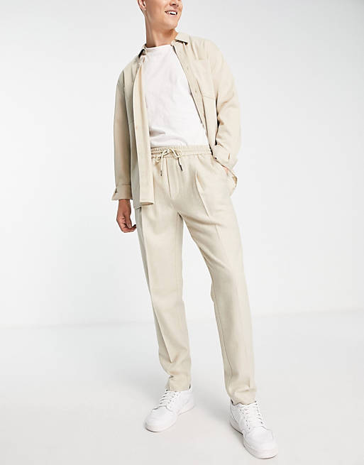 Topman tapered wool mix pleat pants with elasticated waistband in off white