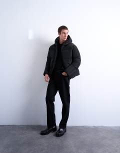 Model wearing Textured puffer jacket in black