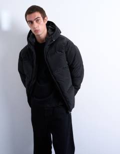Model wearing Textured puffer jacket in black