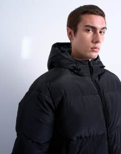 Model wearing Textured puffer jacket in black