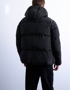 Model wearing Textured puffer jacket in black