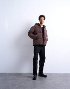 Model wearing Textured puffer jacket in dark brown