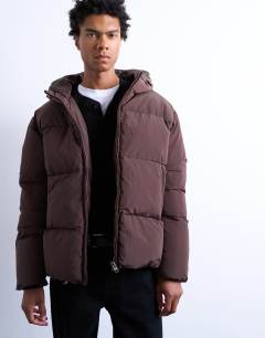 Model wearing Textured puffer jacket in dark brown