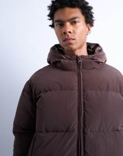 Model wearing Textured puffer jacket in dark brown