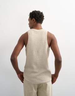 Model wearing Textured vest in stone