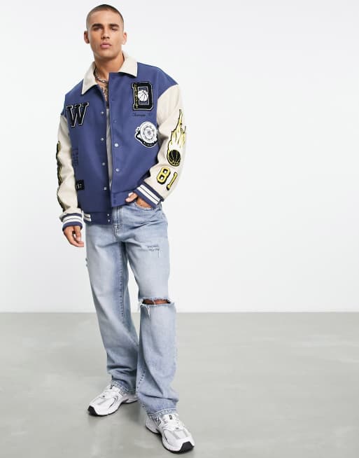 A guest is seen wearing a Louis Vuitton varsity jacket, blue and