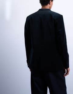 Model wearing Velvet blazer in black