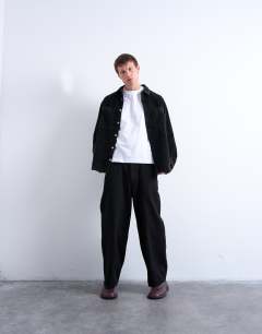 Model wearing Washed cord overshirt in black