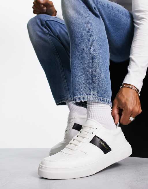 White trainers sales black stripe