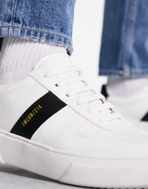 White trainers sale black stripe