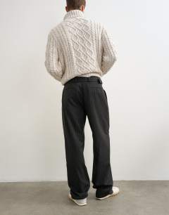Model wearing Wide leg belted pinstripe trouser with pleats in grey