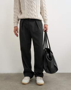 Model wearing Wide leg belted pinstripe trouser with pleats in grey