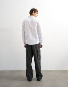 Model wearing Wide leg belted smart trouser with side pockets in charcoal